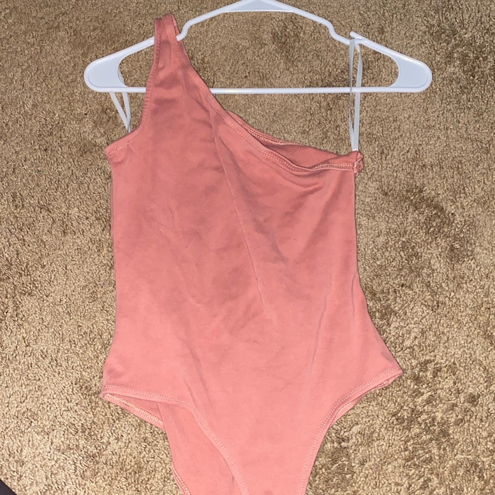 Pink body suit